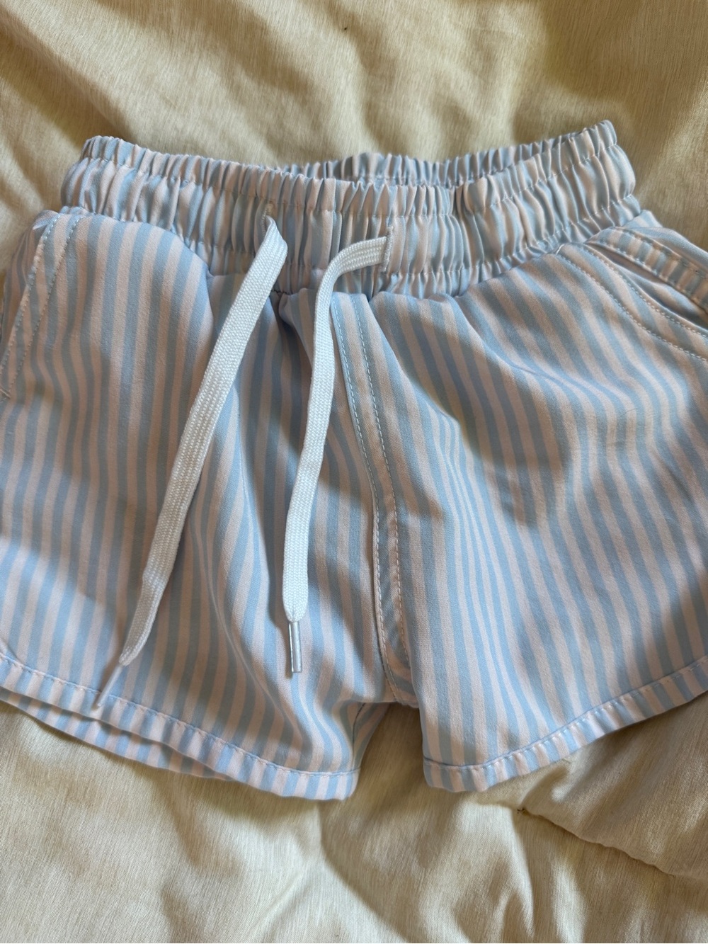 Kortni JeanStriped Blue and White boy’s swim trunks